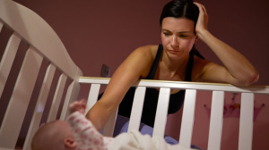 mum looking worried with baby